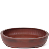 12.25 oval unglazed reddish Yixing pot with gloss finish - PW64