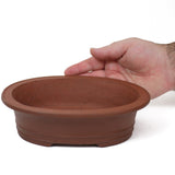 Medium Small oval unglazed reddish Yixing Chinese pot - PW21